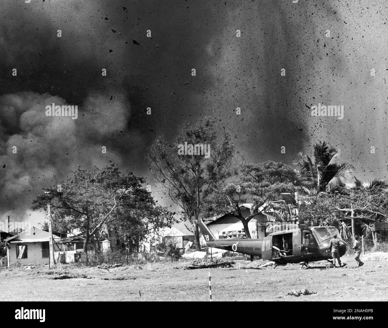 Specific date unknown. Bombs explode in the Cholon section of Saigon ...
