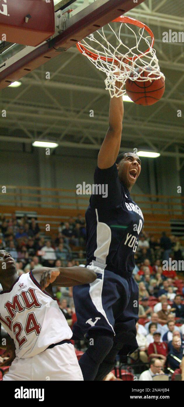 Loyola Marymount's Ayodeji Egbeyemi (24) looks on as BYU's Brandon