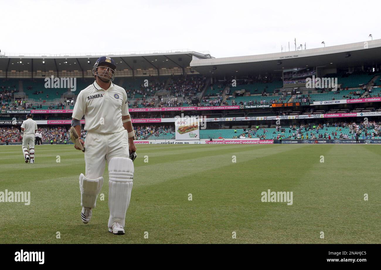 India's batsman Sachin Tendulkar walks off the field after he was
