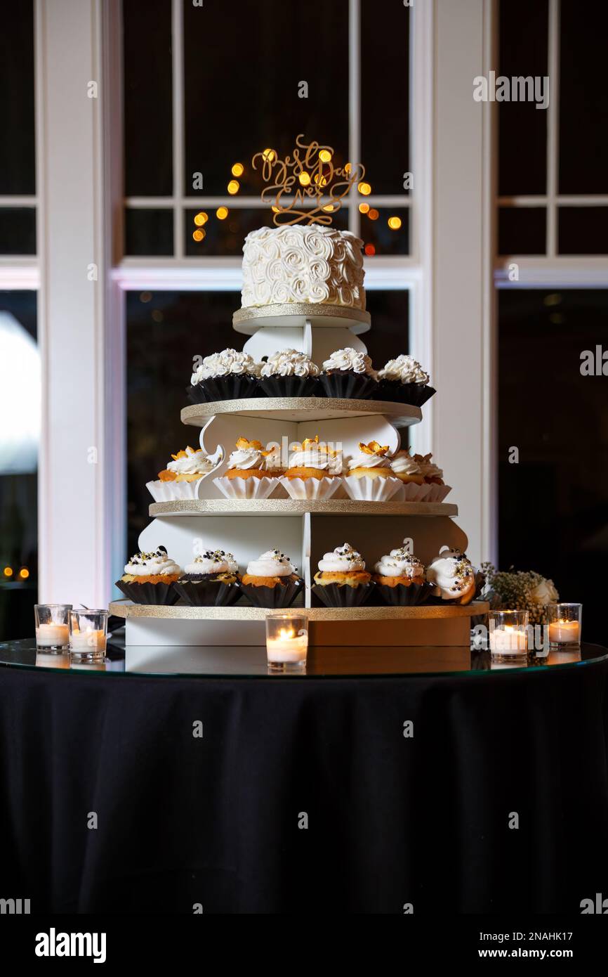 Cupcake 3 4 tier wedding cake with candles Stock Photo