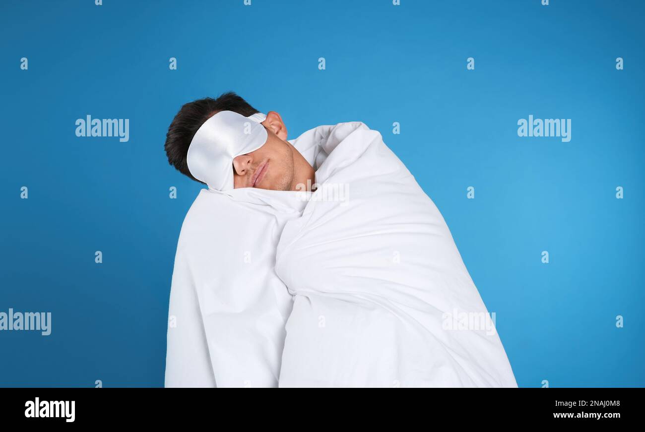 Man sleeping wearing eye mask hi-res stock photography and images - Alamy