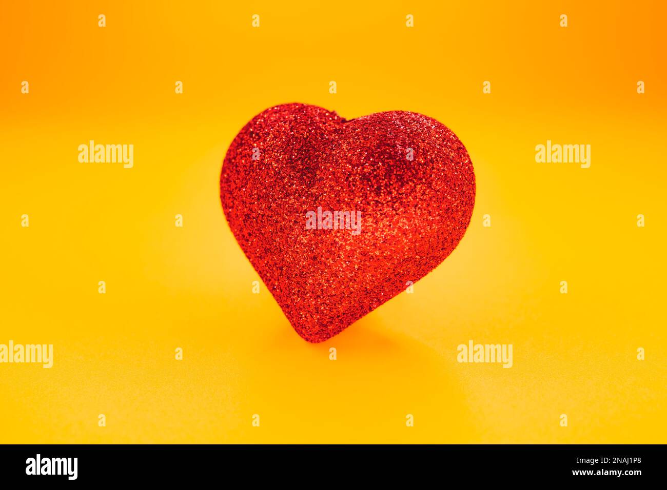 heart shape on the yellow background Stock Photo