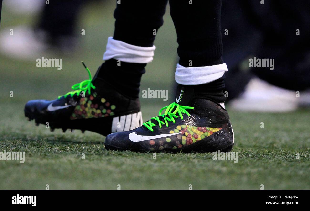 Seattle Seahawks Marshawn Lynch wears shoes with candy Skittles on the sides in the second half of an NFL football game against the San Francisco 49ers in Seattle Saturday Dec. 24 2011