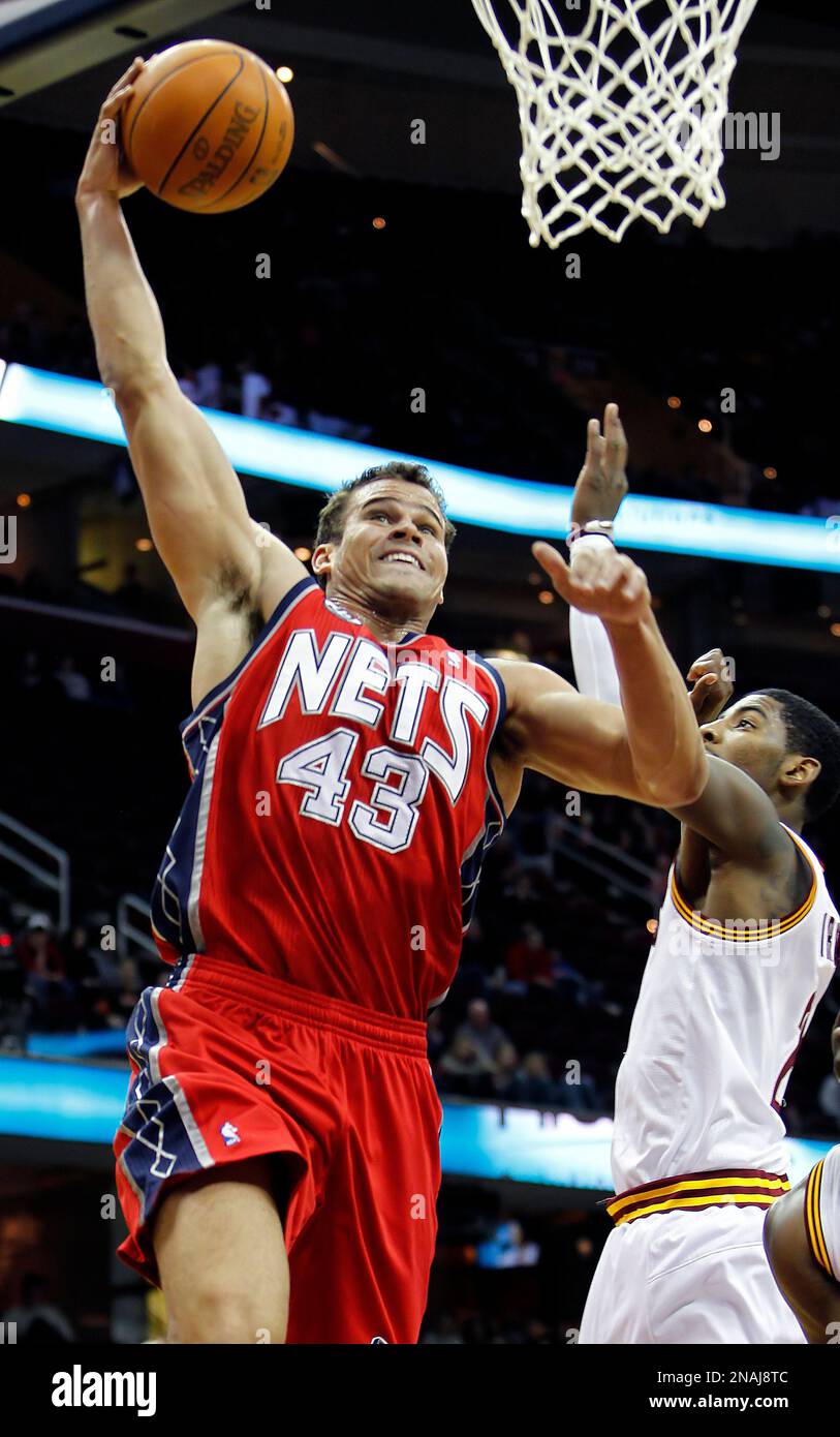 New Jersey Nets' Kris Humphries goes up for a shot against Cleveland