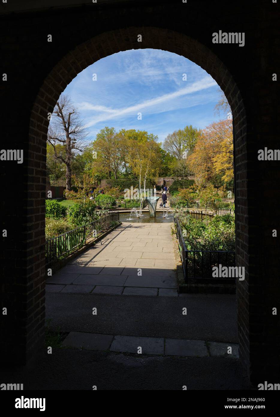 London - 04 11 2022: view of the Dutch garden in Holland park from inside an archway Stock Photo