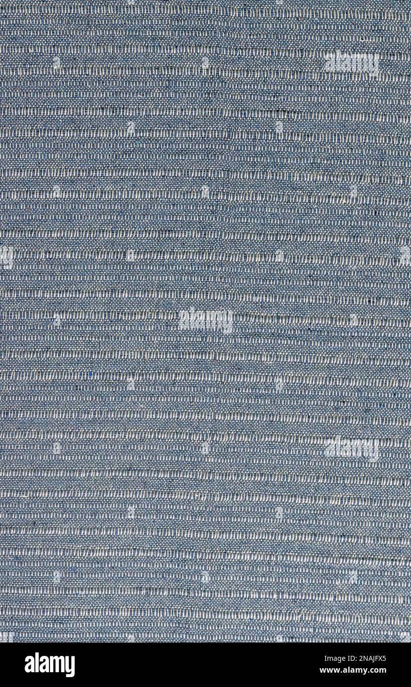 Cotton textile gray material close-up abstract defocused background. Stock Photo