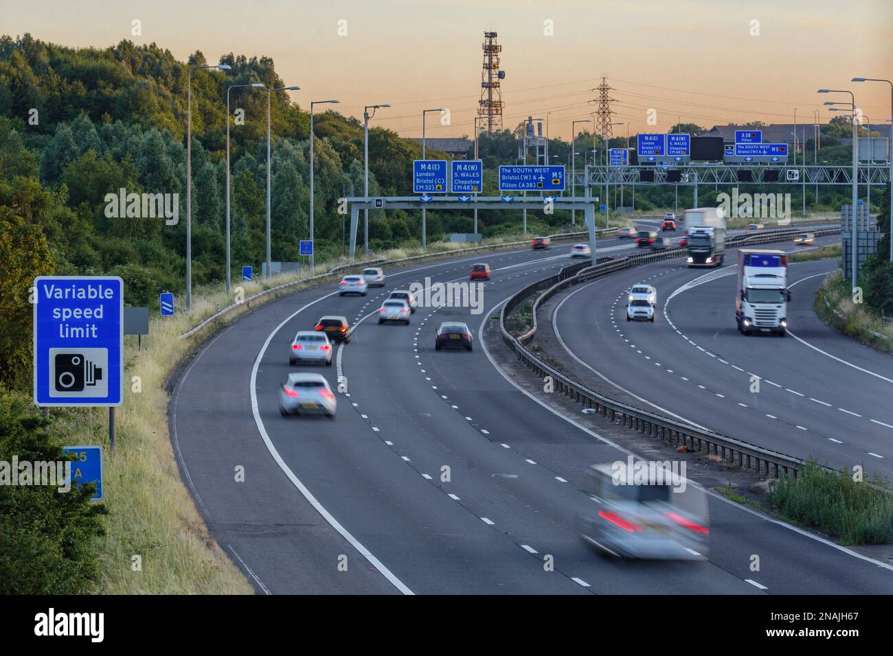 Vehicles move quickly past an intersection on the M5 motorway near
