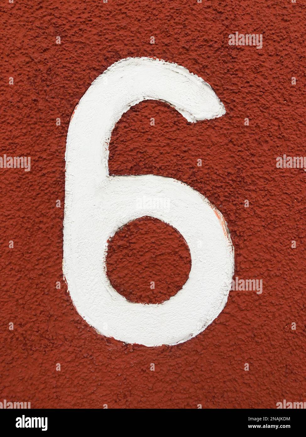 number six in arabic numeral - house number 6 in white paint on red ...