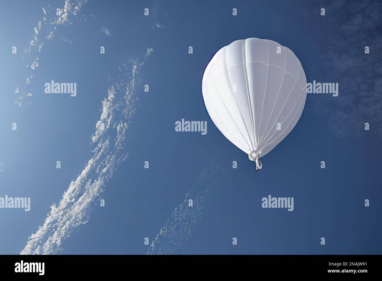 Chinese white balloon balloon, a reconnaissance or research weather probe in the sky, violated the airspace Stock Photo
