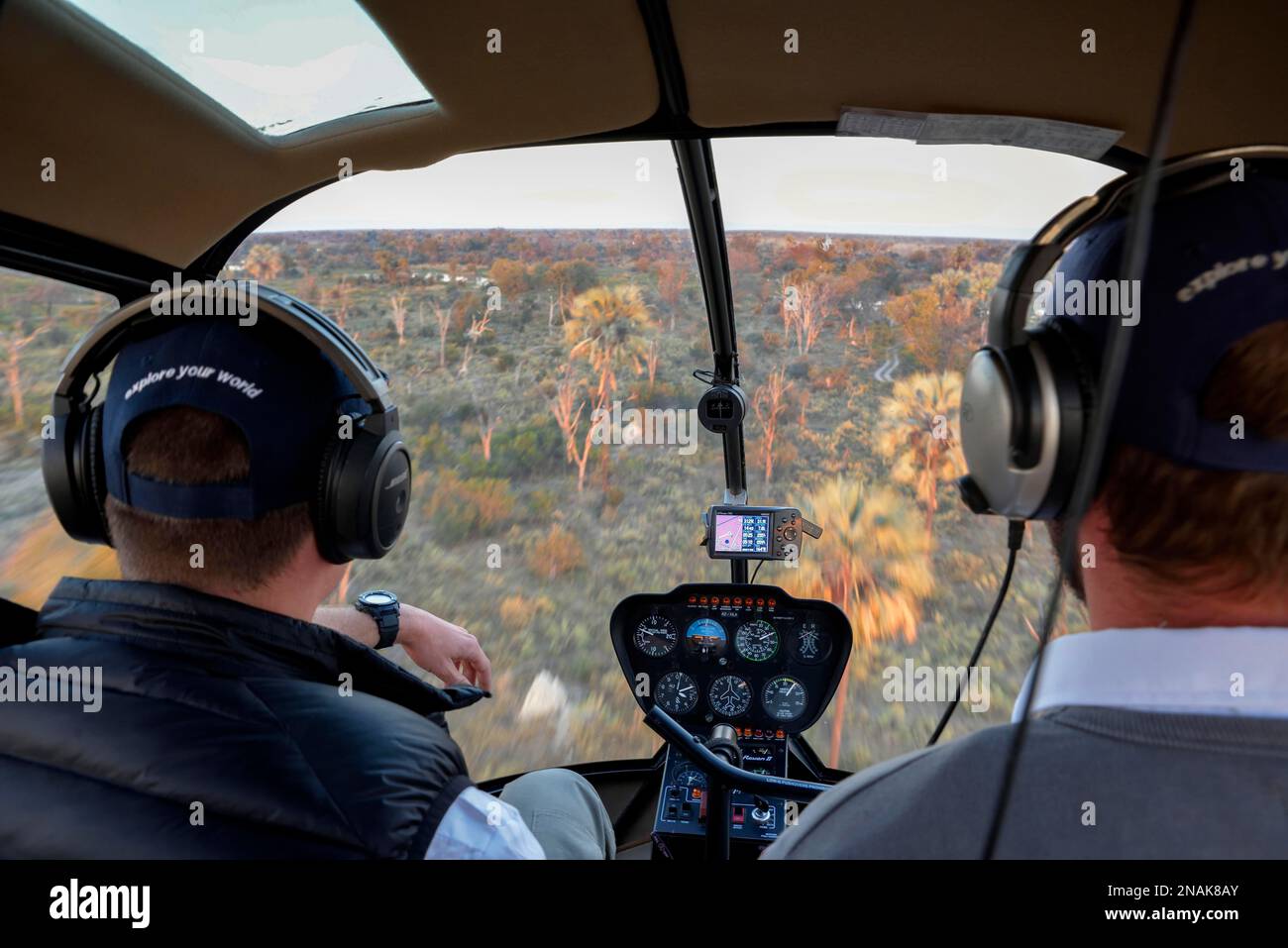 Bush pilots in their helicopter, flying safari, Gomoti Plains, Okavango
