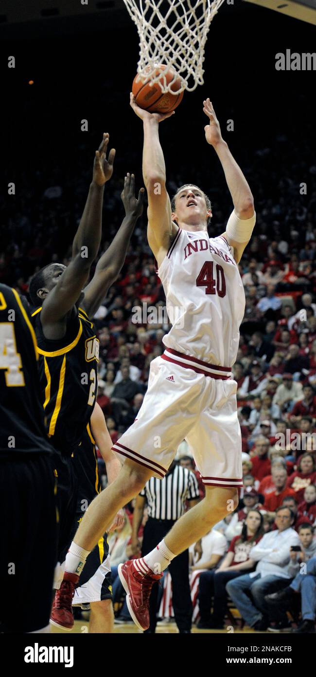 Indiana's Cody Zeller (40) puts up a shot over UMBC's Jamar Wertz (21