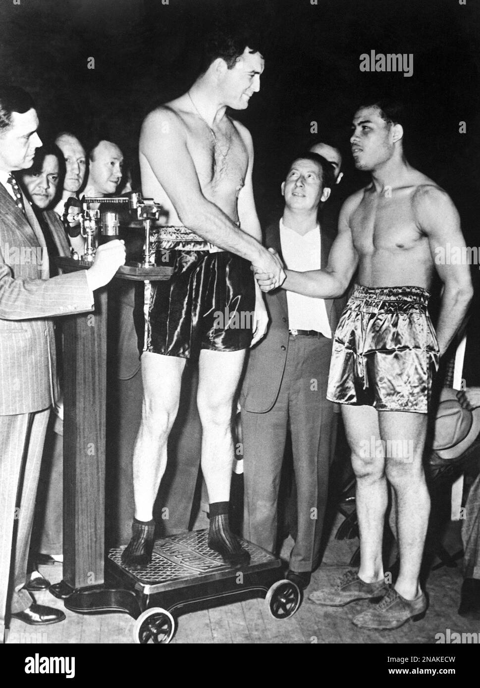 James J. Braddock, World Heavyweight champion and Joe Louis, weighed in