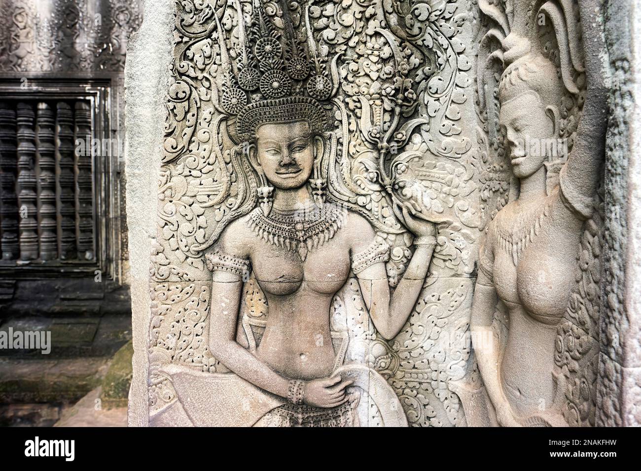 Bas relief depicting Apsara Dancers. Khmer culture, Angkor Wat, Siem Reap, Cambodia Stock Photo