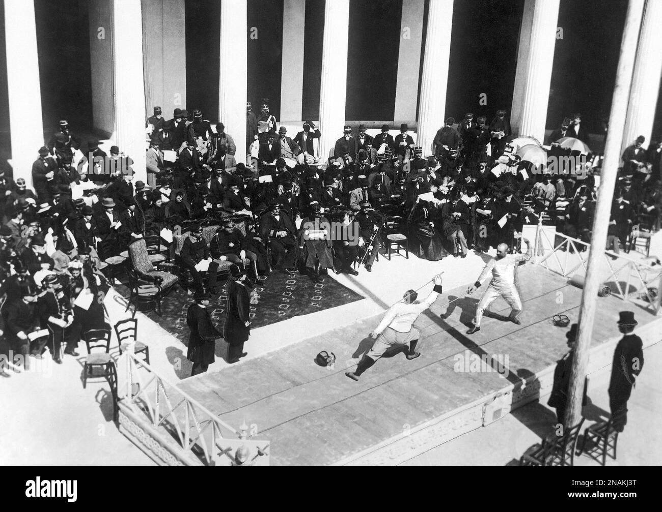 Members of the Greek and French fencing team in action during the foil
