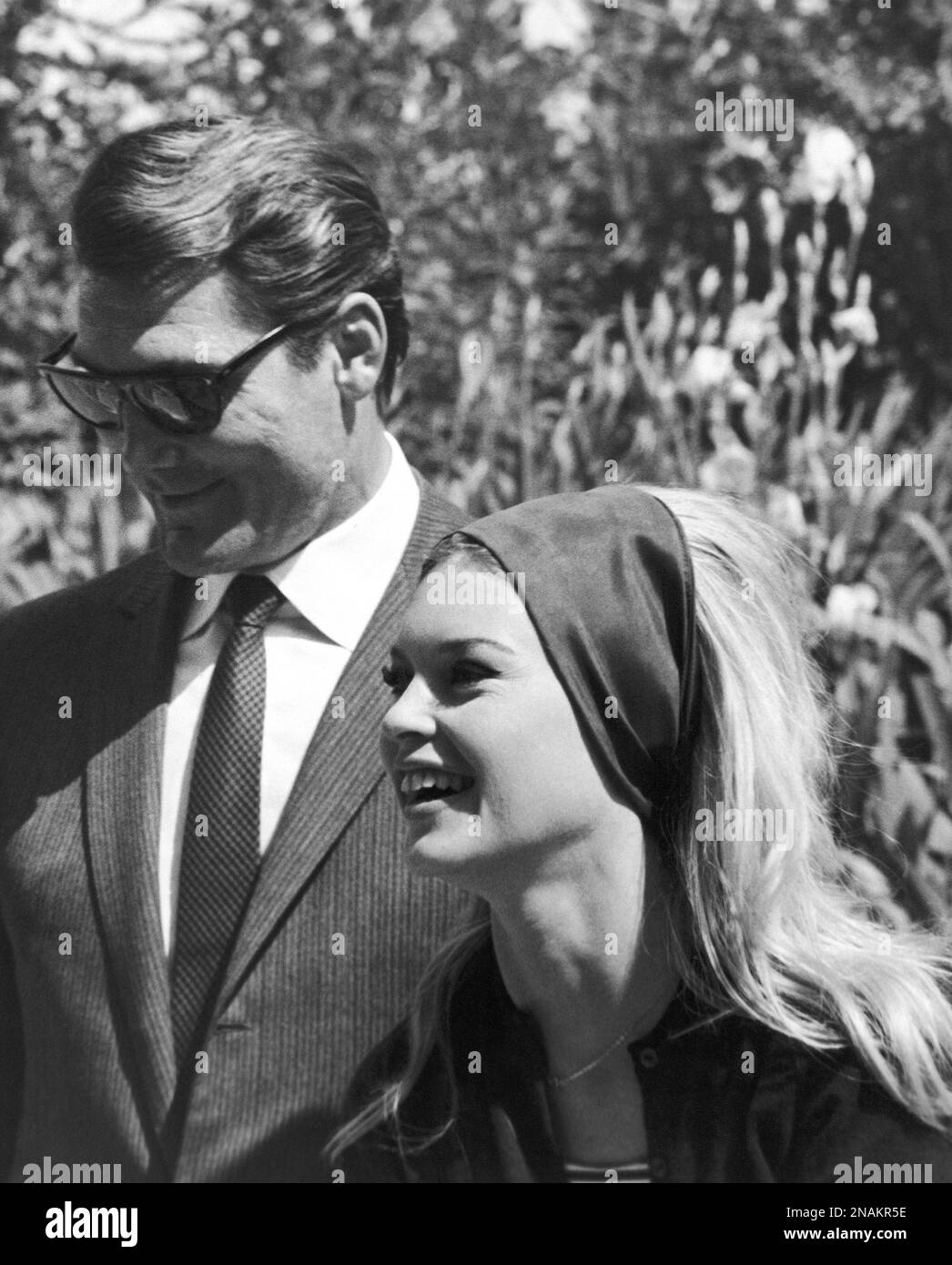 American Actor Jack Palance And French Actress Brigitte Bardot Walk 