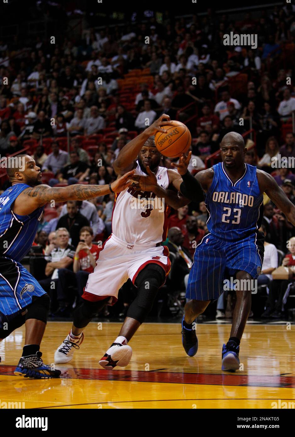 Miami Heat guard Dwyane Wade (3) goes up for a shot against Orlando