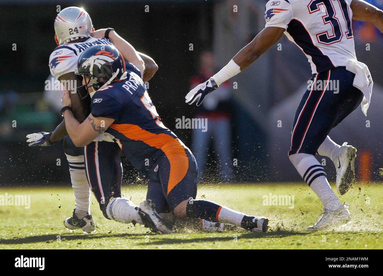 Denver Broncos kicker Matt Prater (5) tackles New England Patriots ...