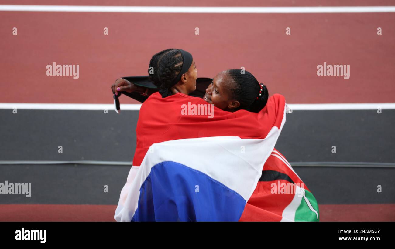 AUG 06, 2021 - Tokyo, Japan: Faith KIPYEGON of Kenya wins the Gold Medal in the Athletics Women's 1500m Final and is hugged by Sifan HASSAN of Netherl Stock Photo