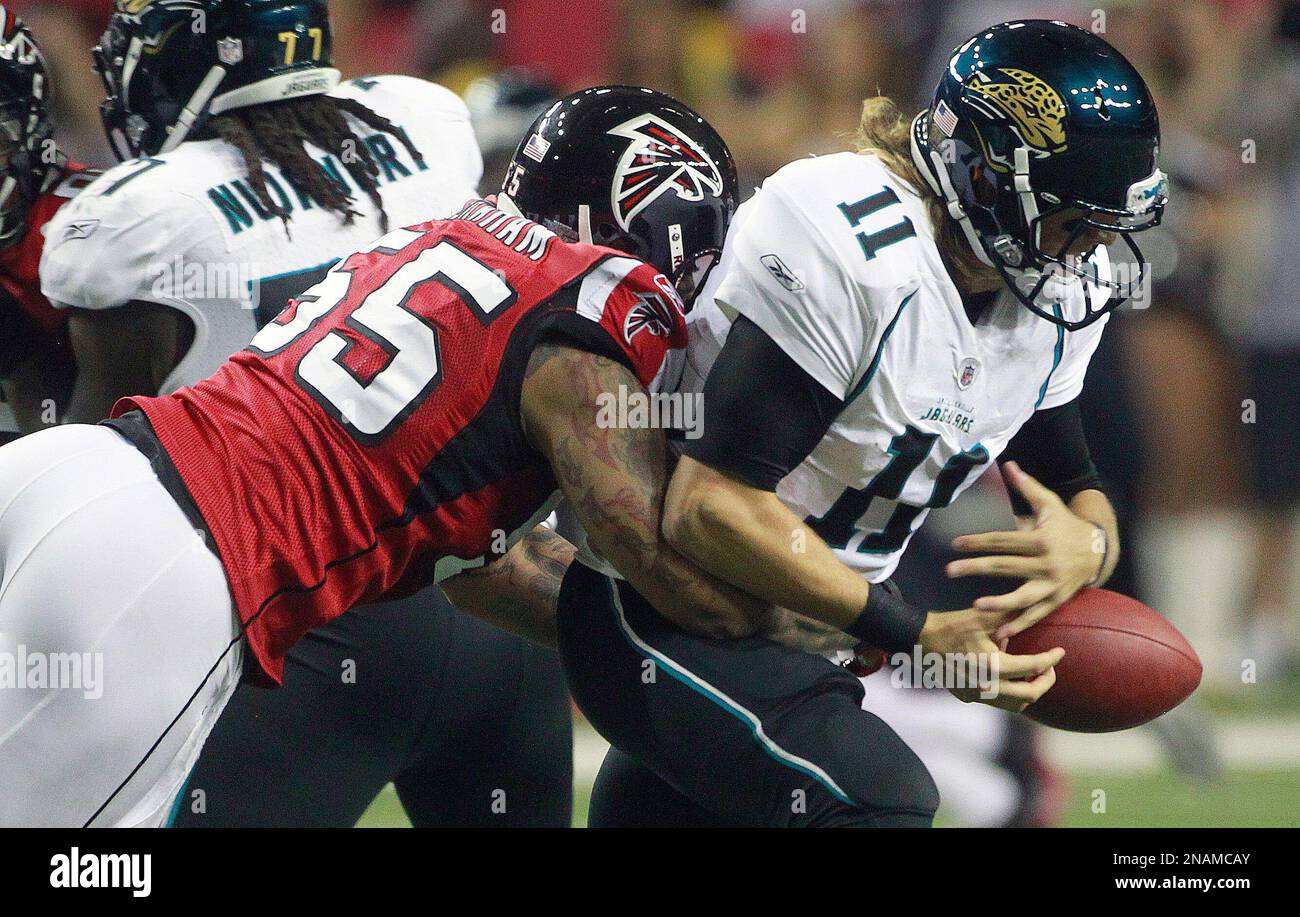 Atlanta Falcons defensive end John Abraham (55) hits Jacksonville ...