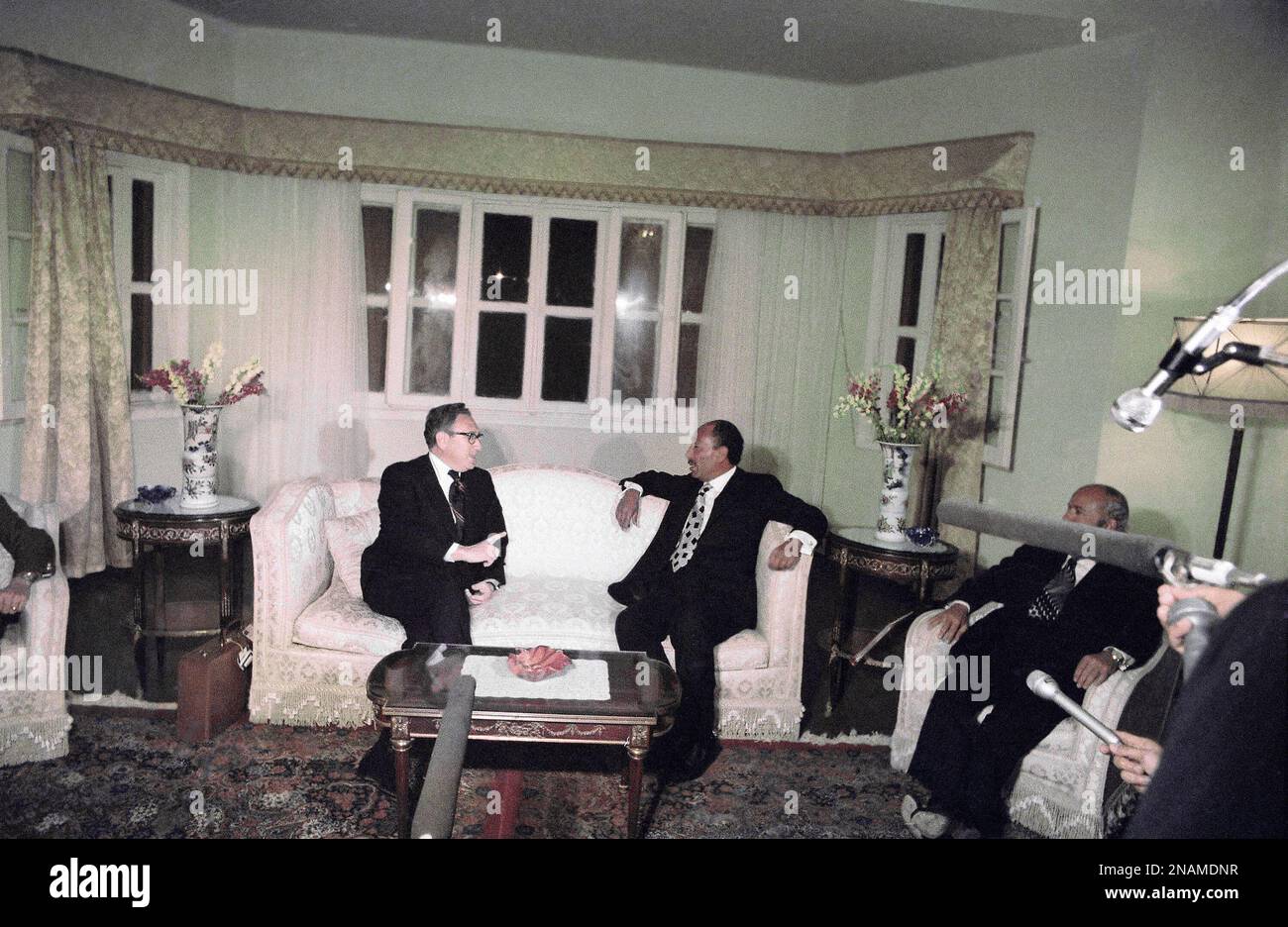 Henry Kissinger, Secretary of State meets with Egypt’s President Anwar Sadat in Aswan, Egypt in March 1975. (AP Photo/Ahmed Tayeb) Stock Photo