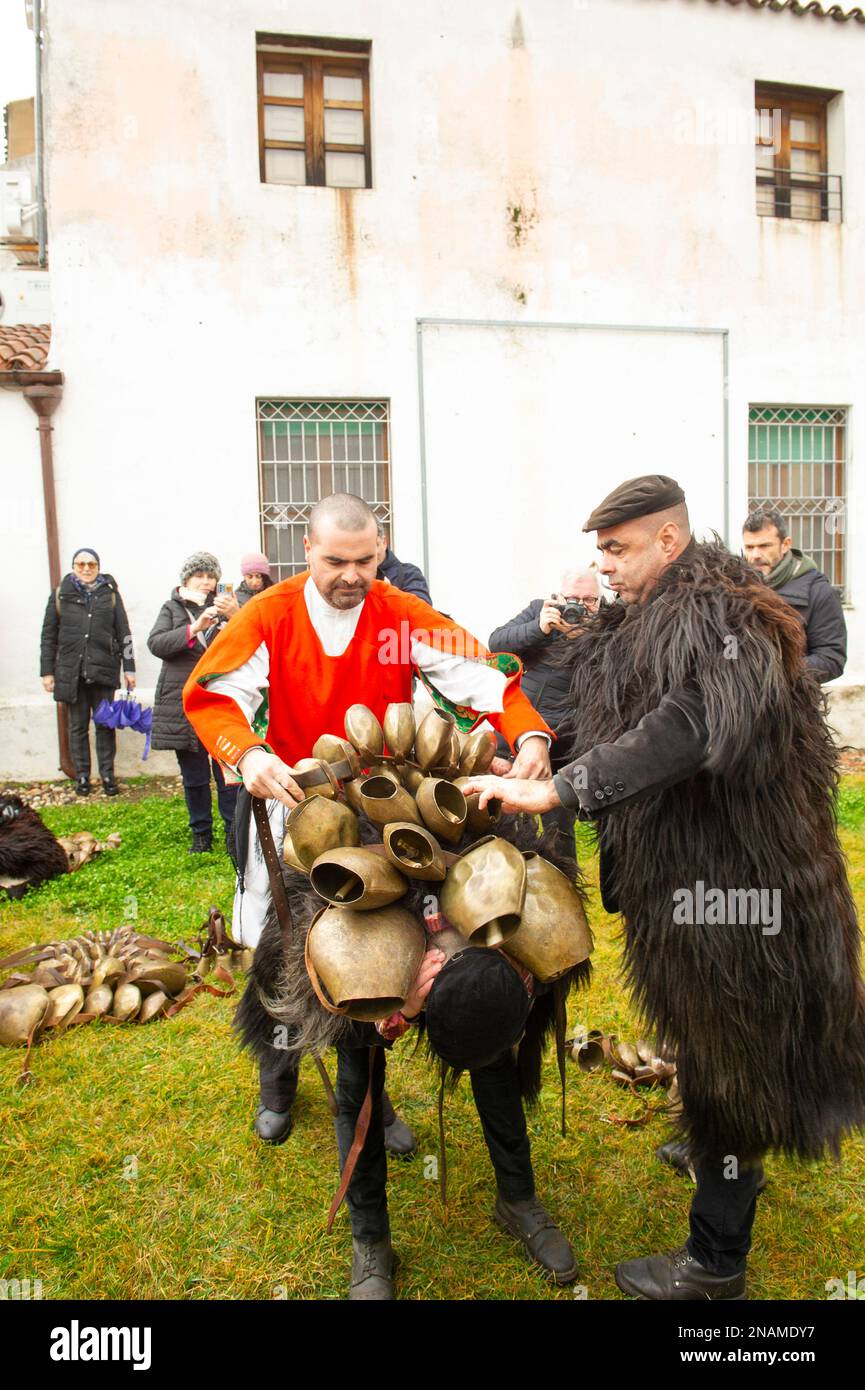 2023 January 17 - Italy, Sardinia, Sassari, Mamoiada. Traditional and millennial bonfire of St. Antonio with the traditional masks of the 'Mamuttones' Stock Photo