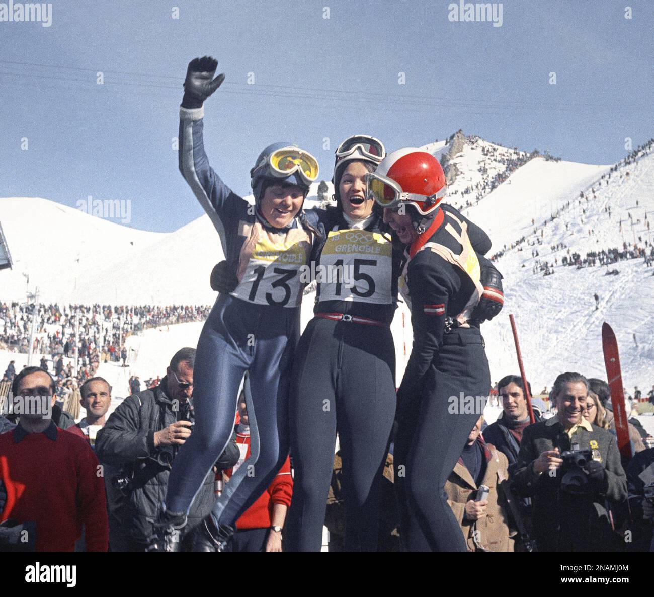Winners of Women's Downhill Olympic Ski event on victory rostrum at ...