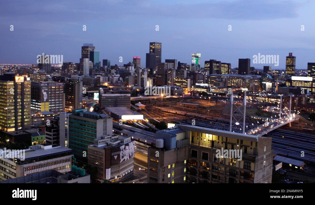 This Nov. 18, 2011 photo shows the city lights, after sunset, in