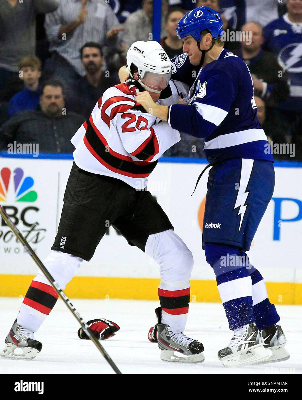Tampa Bay Lightning defenseman Pavel Kubina, right, fights with New