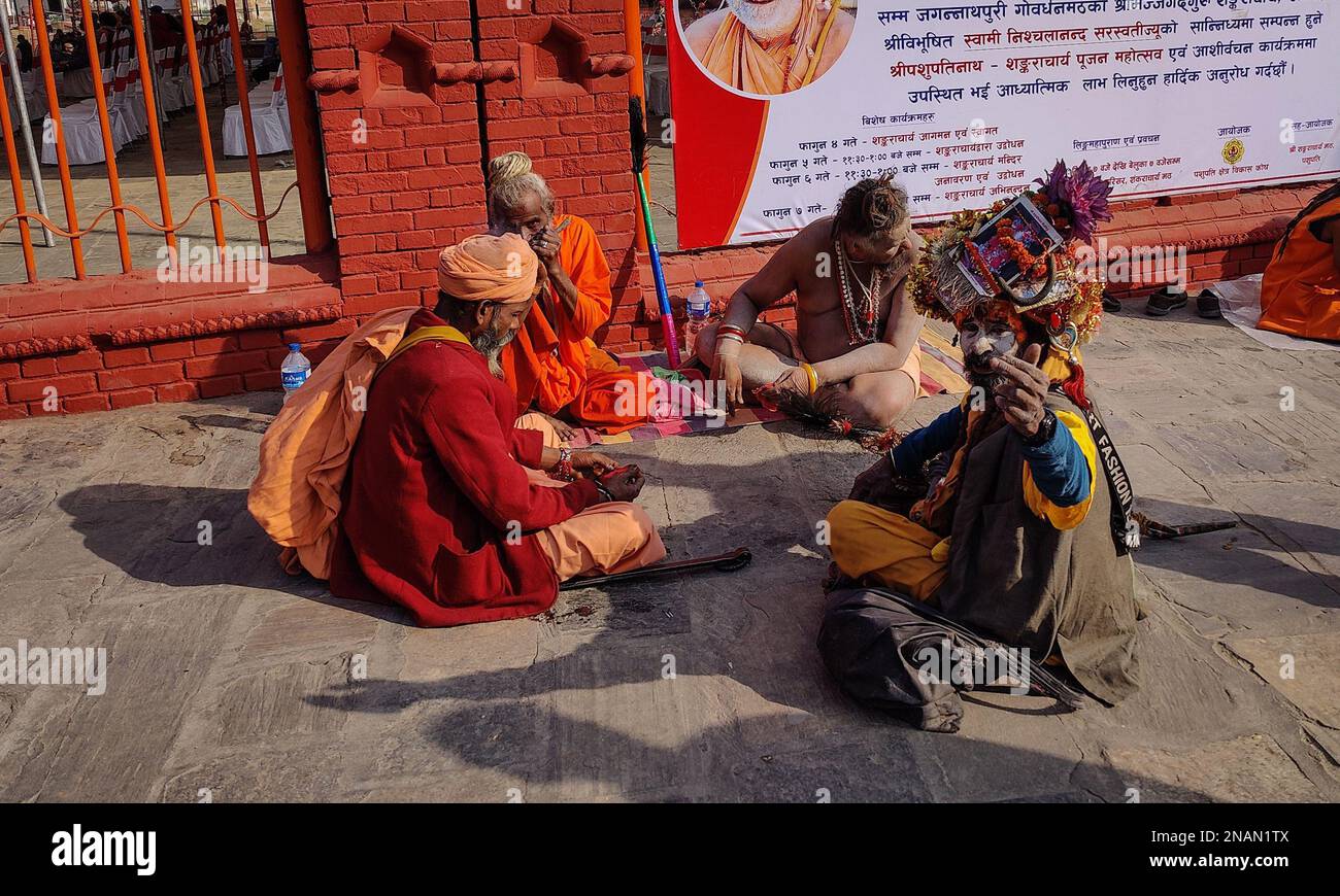 Kathmandu, Bagmati, Nepal. 13th Feb, 2023. Sadhus (holy men) rest after arrival for upcoming Shivaratri festival at premises of Pashupatinath temple in Kathmandu, Nepal on February 13, 2023. Hundreds of Sadhus from across the country and neighboring India arrive to celebrate Maha Shivaratri, a festival in honour of Lord Shiva, which falls on February 18, 2023. (Credit Image: © Sunil Sharma/ZUMA Press Wire) EDITORIAL USAGE ONLY! Not for Commercial USAGE! Credit: ZUMA Press, Inc./Alamy Live News Stock Photo