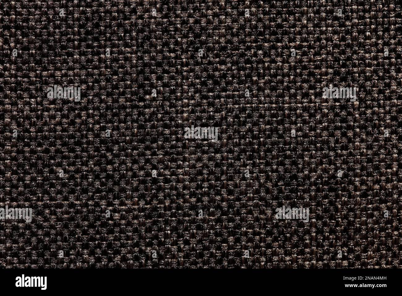 Black textile background with unique surface. Superlative dark