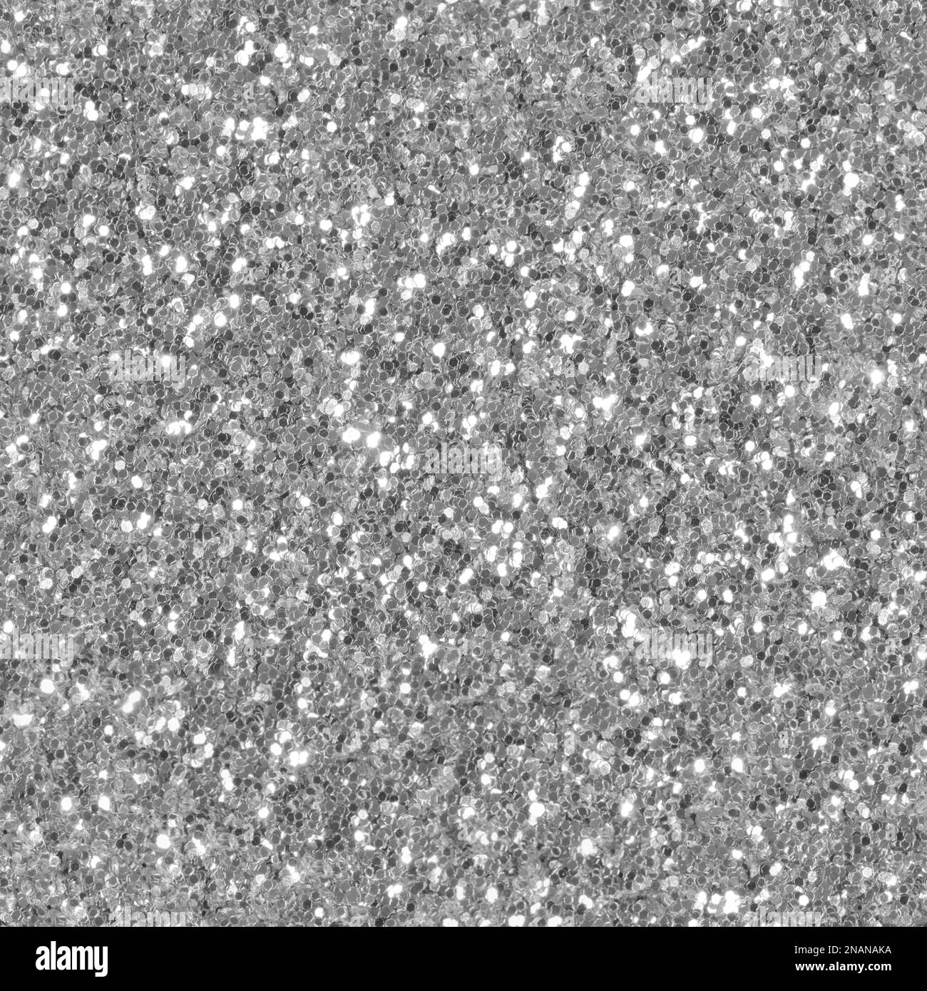 Silver glitter sparkle. Background for your design. Extremely high resolution, detailed photo of shiny glitter. Stock Photo