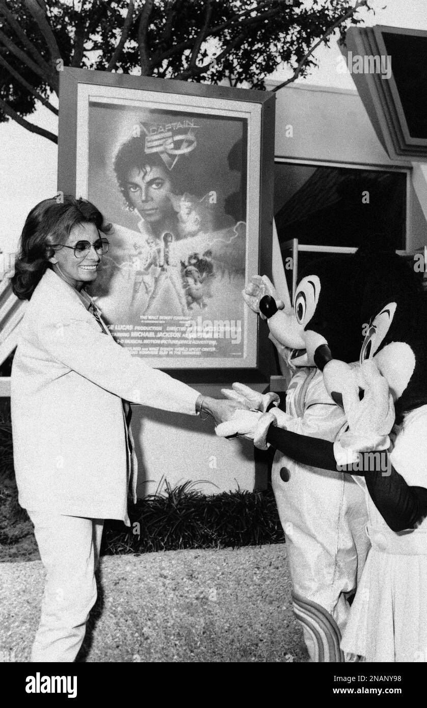 Sophia Loren gets a warm greeting from Mickey and Minnie Mouse