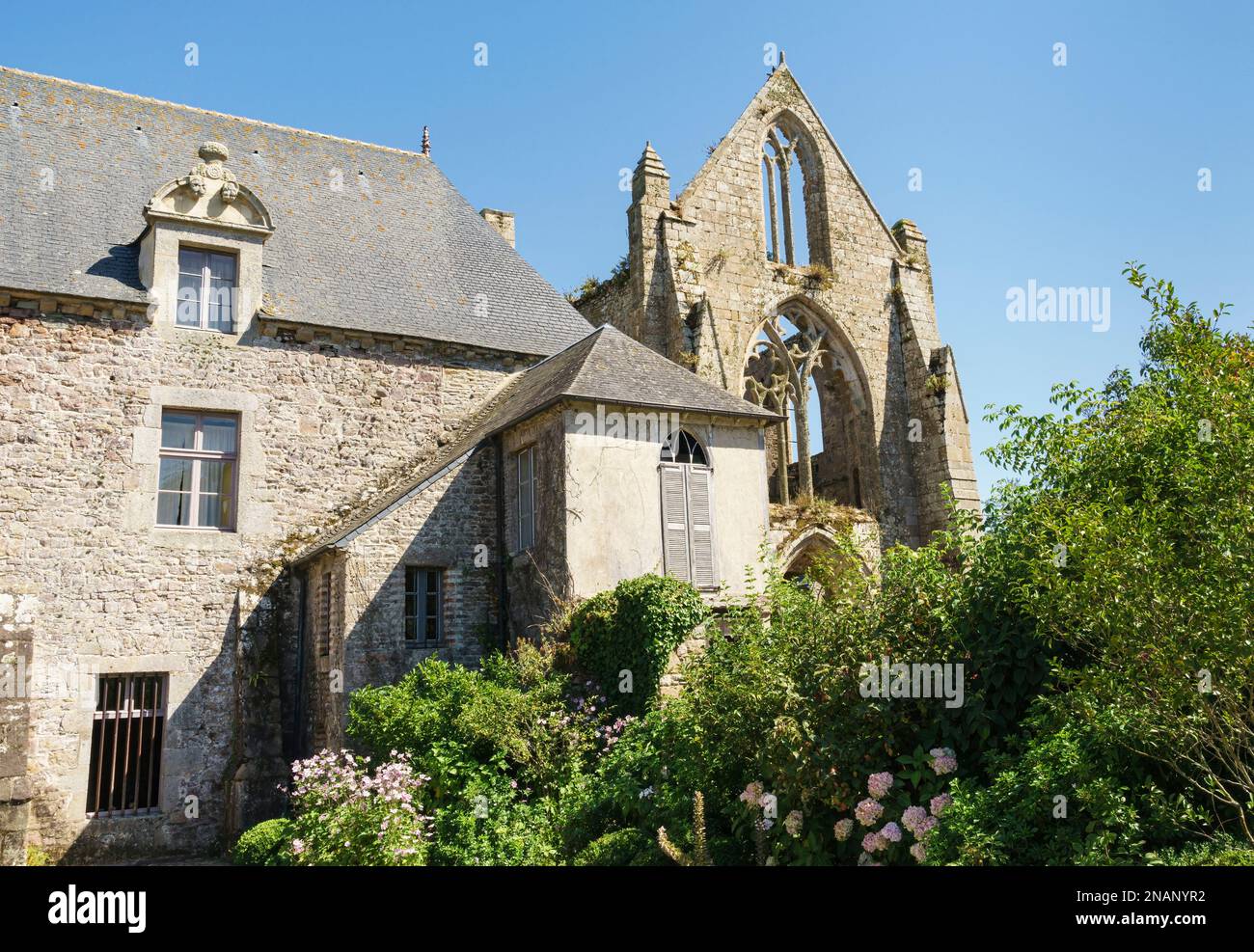 Partial view of the ruins of the Abbey of Beauport in the French commune of Paimpol, with blue sky and sunny day. Stock Photo
