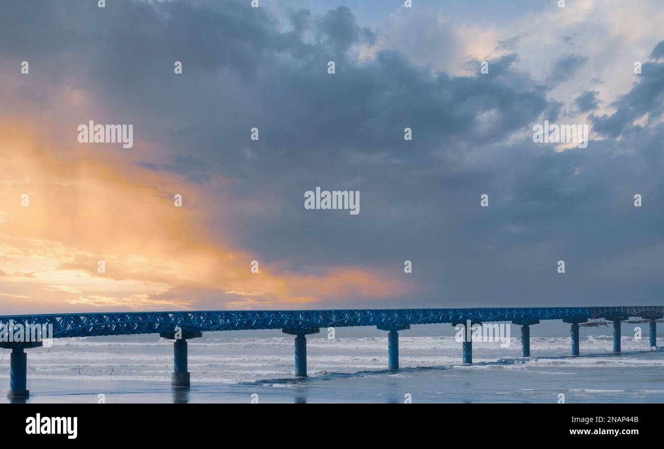 A Beautiful Bridge On The Inani Beach At Sunset Cloudy And Purple Sky