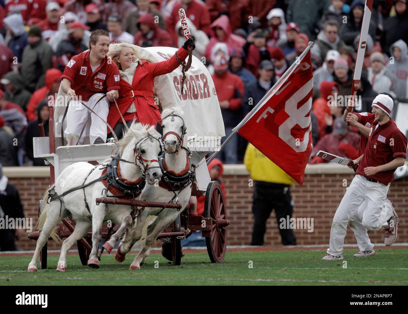 The Sooner Schooner is driven onto the field to celebrate an Oklahoma