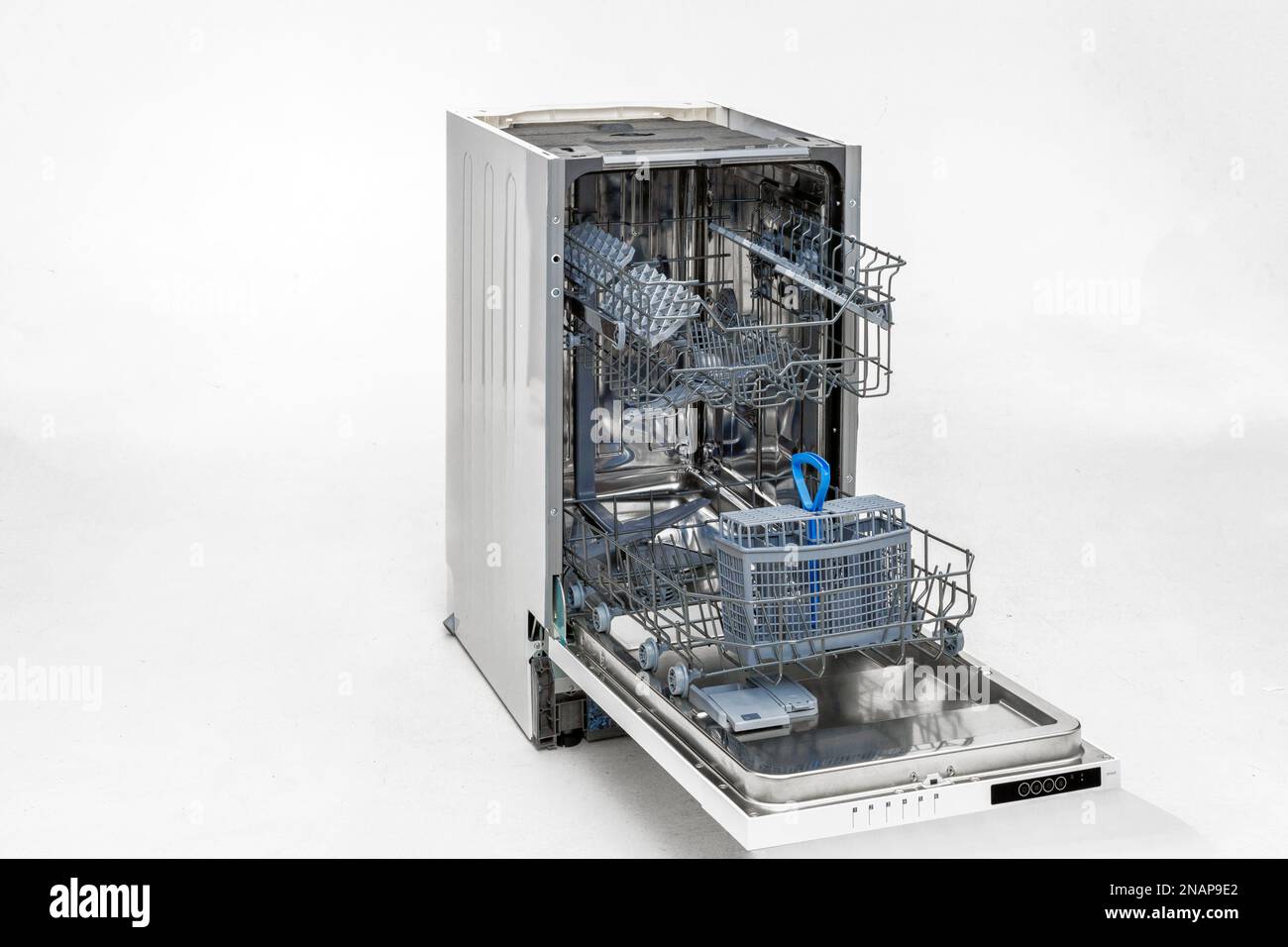 Dishwasher with electronic control, open door, racks and container. The