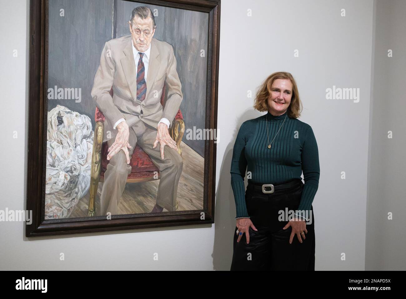 Francesca Thyssen-Bornemisza poses next to the painting 'man in a chair (portrait of Baron Thyssen)' during the presentation of the Lucian Freud exhibition at the Thyssen-Bornemisza museum in Madrid. Stock Photo