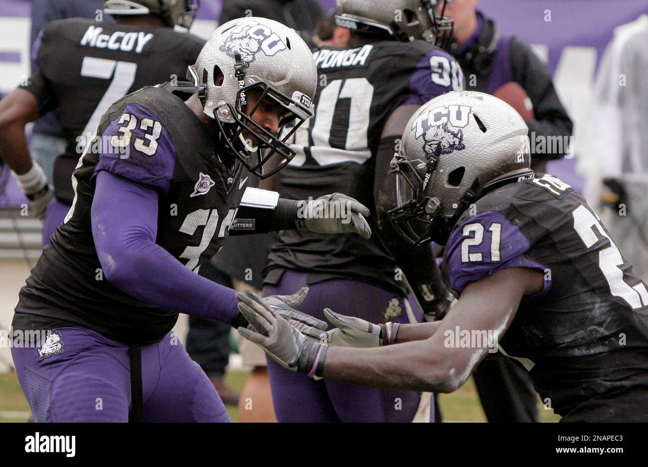 https://c8.alamy.com/comp/2NAPEC3/tcu-safety-johnny-fobbs-21-congratulates-teammate-linebacker-kris-gardner-33-after-intercepting-a-unlv-pass-and-returning-it-for-a-touchdown-in-the-first-half-of-an-ncaa-college-football-game-saturday-dec-3-2011-in-fort-worth-texas-tcu-won-56-9-apbrandon-wade-2NAPEC3.jpg