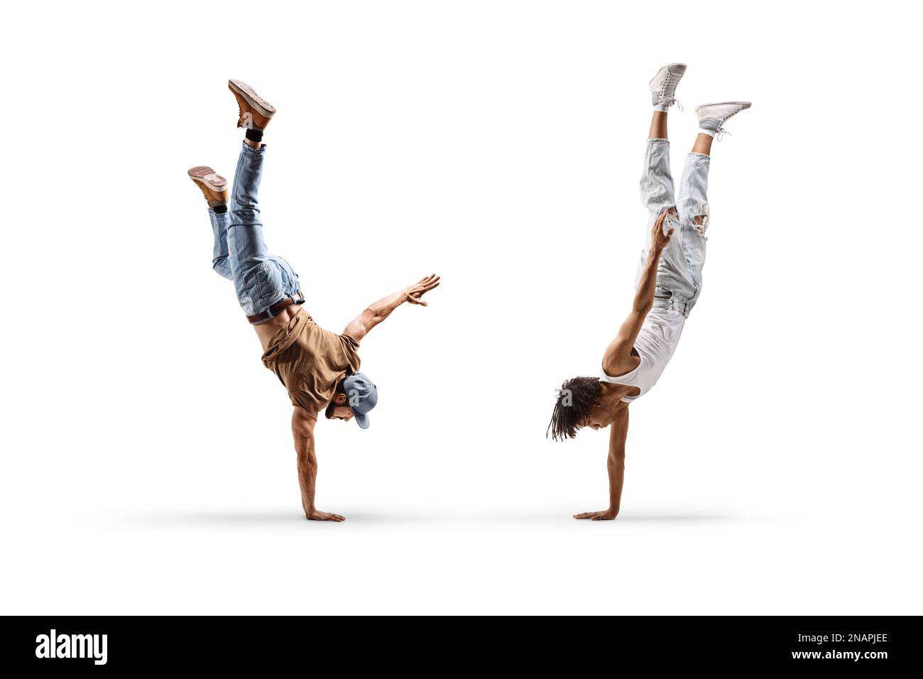African american male dancer and a caucasian performing a handstand isolated on white background Stock Photo