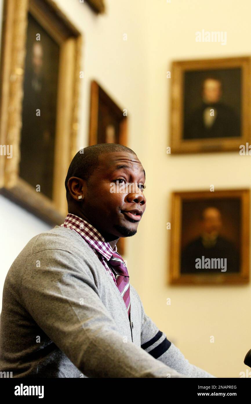 Philadelphia Phillies baseball player Ryan Howard waves as he is introduced  during a news conference, to announce a donation from the Ryan Howard Family  Foundation to the School District of Philadelphia, at