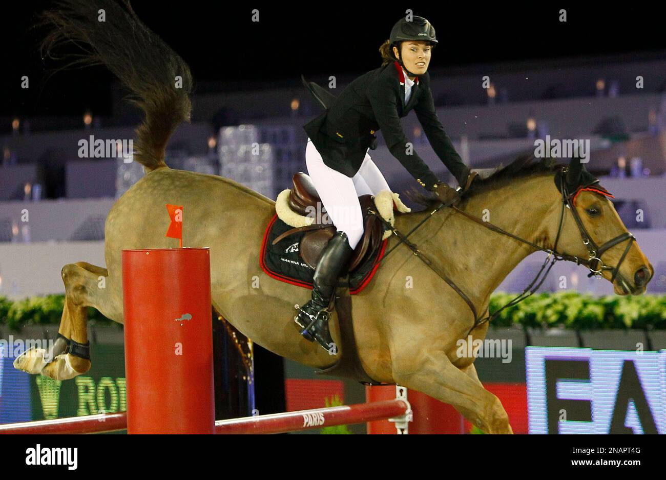 Former tennis star Martina Hingis of Switzerland rides her horse Ragana ...
