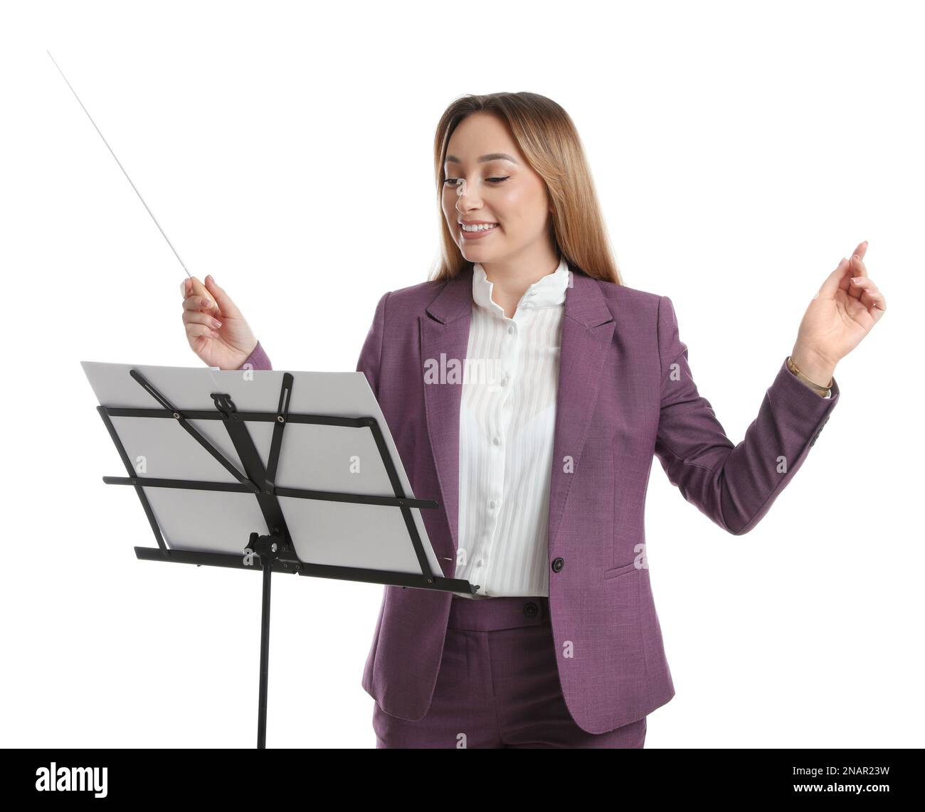 Music teacher with baton and note stand on white background Stock Photo ...