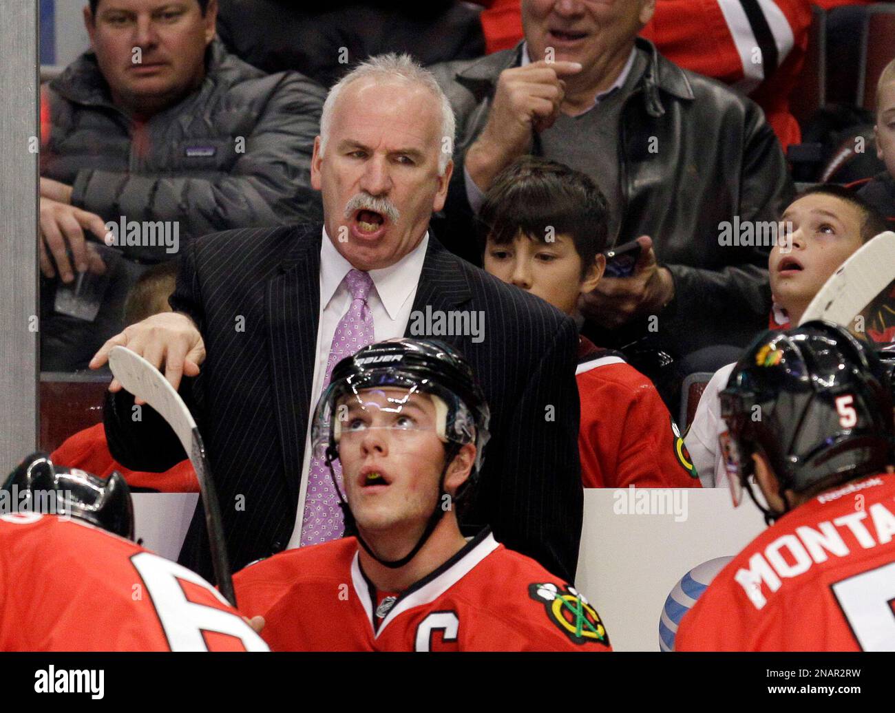 Chicago Blackhawks coach Joel Quenneville yells to his team during the
