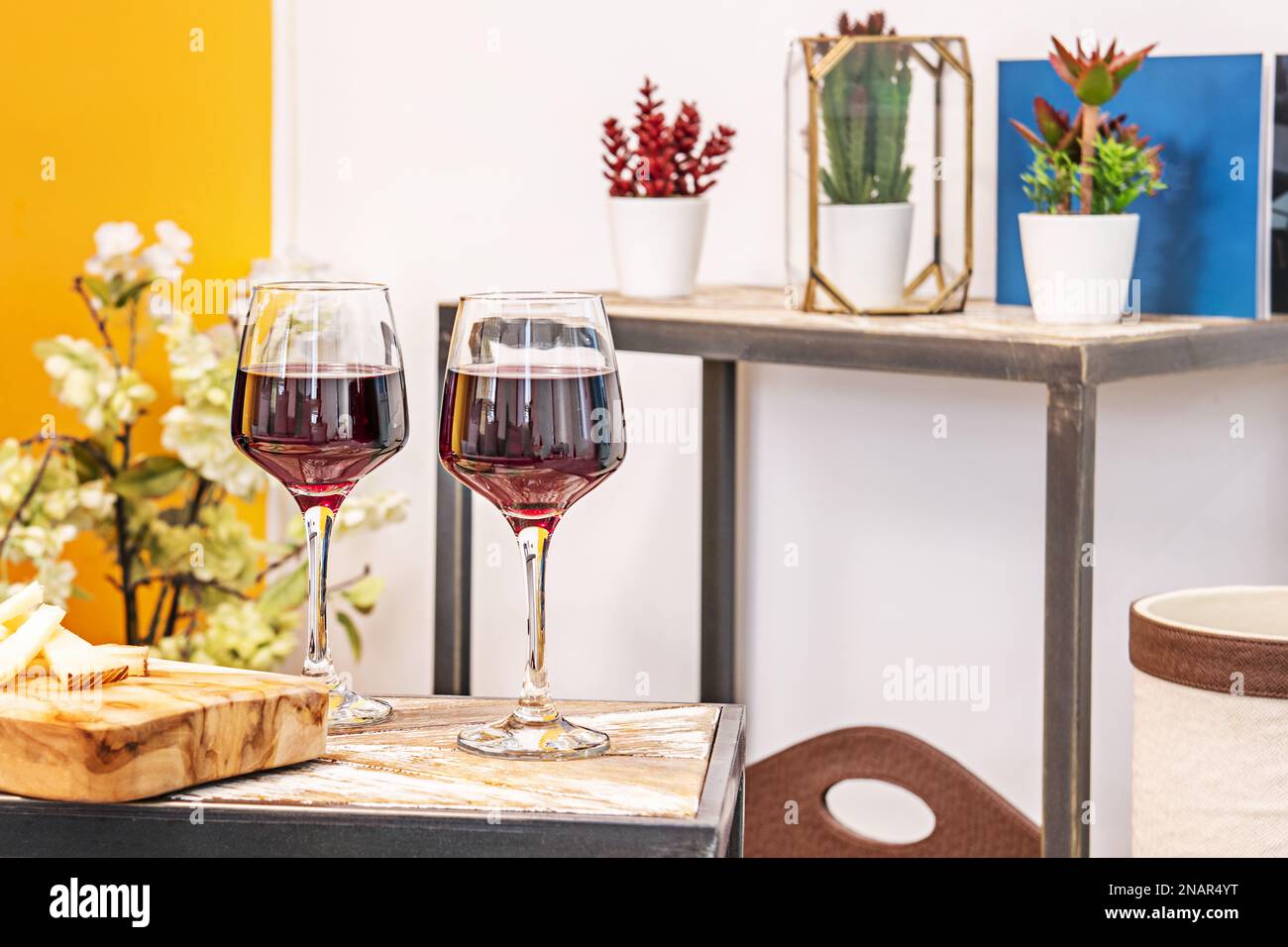 Crystal glasses filled with delicious Spanish red wine on an industrial