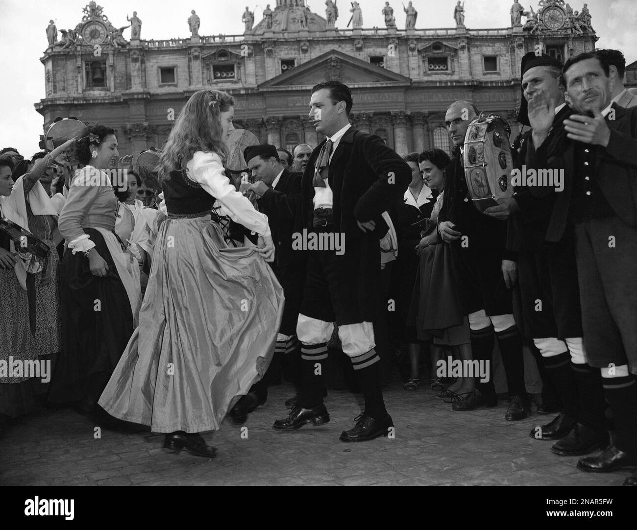 A Sicilian couple dance the Tarantella, a folk dance of Sicily, to the