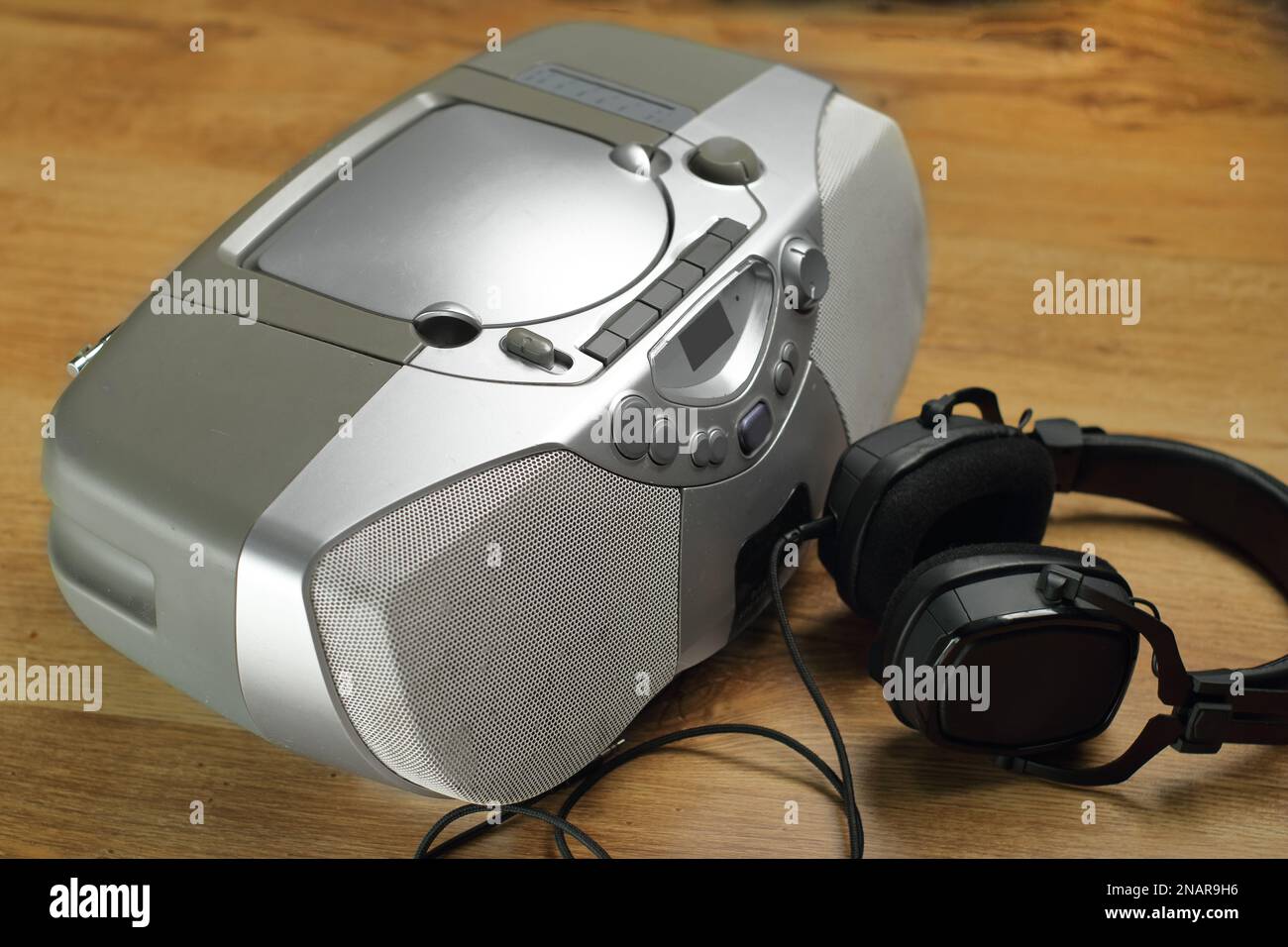 old radio tape recorder with headphones on side panels Stock Photo Alamy