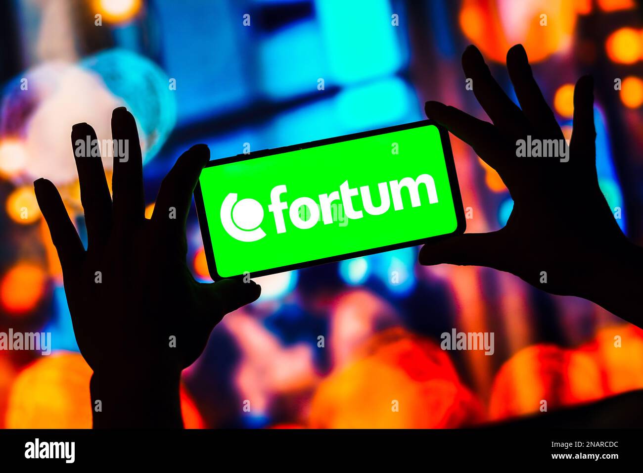 In this photo illustration, the Fortum logo is seen displayed on a ...