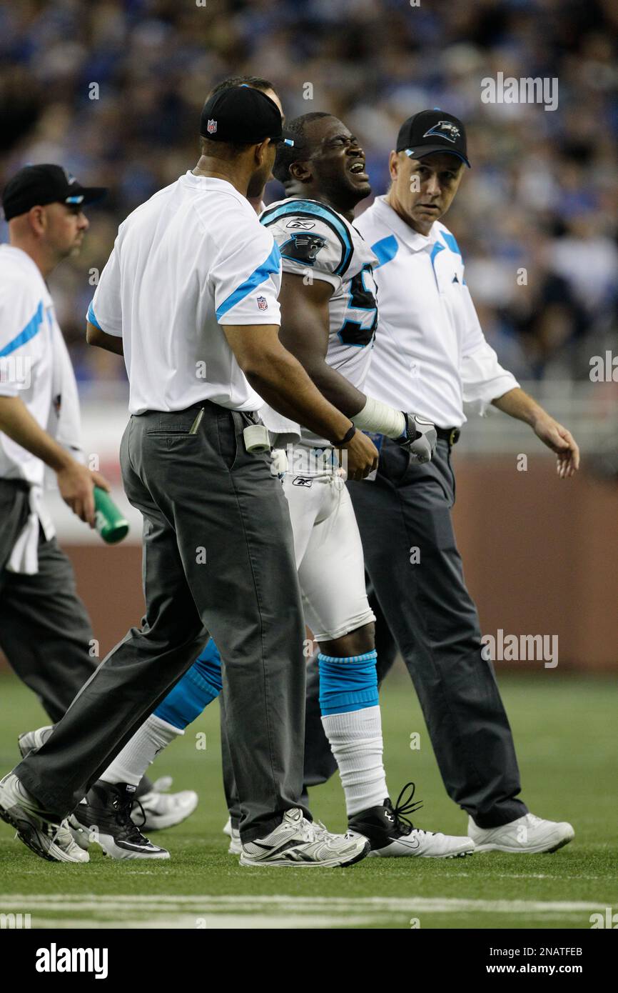 Carolina Panthers outside linebacker Omar Gaither (59) is helped