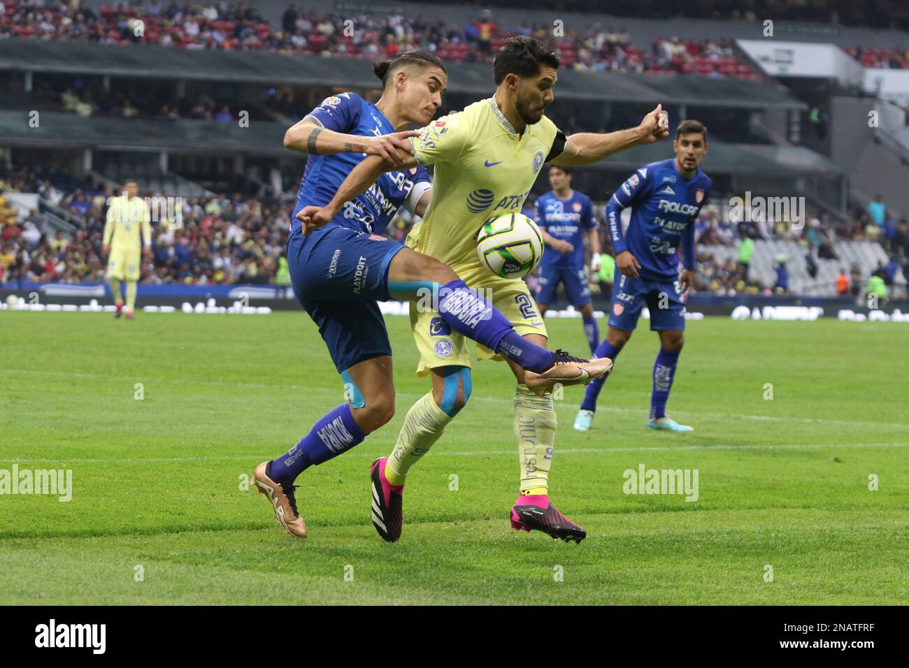 Mexico City, Mexico. 11th Feb, 2023. February 12, 2023 in Mexico City, Mexico: Henry Martín of Club América and Alexis Peña of Necaxa fight for the ball during the America vs Necaxa football match of the closing tournament 2023 at Azteca Stadium. on February 12, 2023 in Mexico City, Mexico. (Photo by Ismael Rosas/ Eyepix Group/Sipa USA) Credit: Sipa USA/Alamy Live News Stock Photo