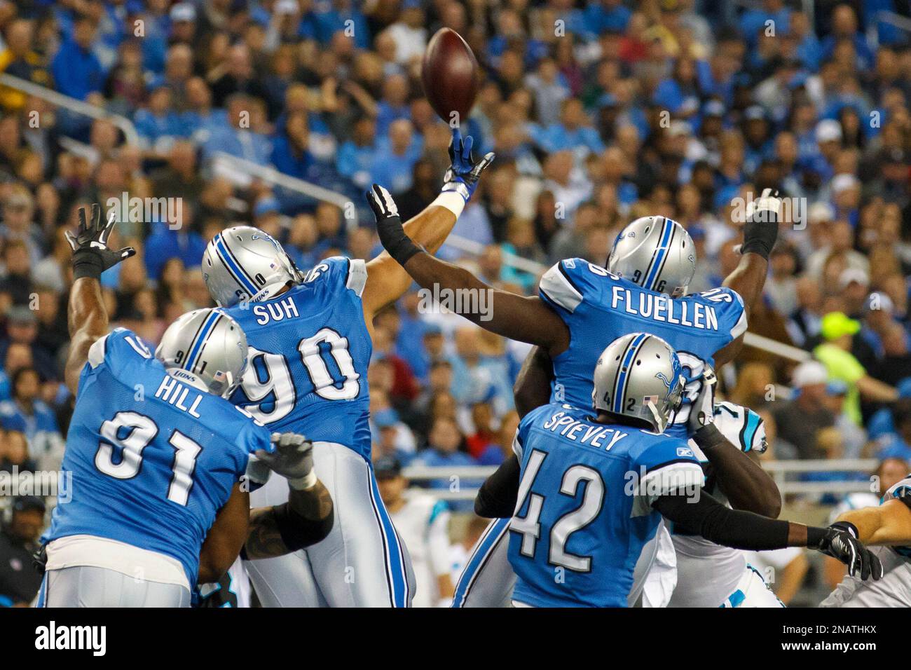 Detroit Lions defensive tackle Ndamukong Suh (90), Sammie Lee Hill (91),  Amari Spievey (42) and tackle Andre Fluellen (96) try to block a field goal  by the Carolina Panthers in the first